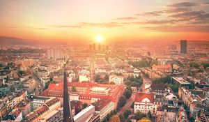 Preview wallpaper city, architecture, tower, buildings, sunset