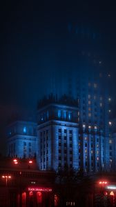 Preview wallpaper city, architecture, tower, buildings, evening, glow