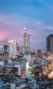 Preview wallpaper city, architecture, towers, buildings, evening