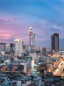 Preview wallpaper city, architecture, towers, buildings, evening