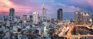 Preview wallpaper city, architecture, towers, buildings, evening