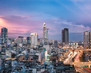 Preview wallpaper city, architecture, towers, buildings, evening