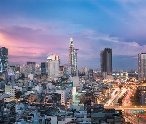 Preview wallpaper city, architecture, towers, buildings, evening