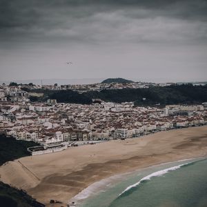 Preview wallpaper city, beach, aerial view, buildings, coast