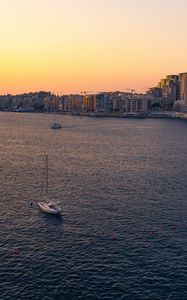 Preview wallpaper city, boats, buildings, water, dusk