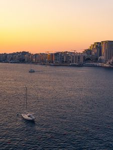 Preview wallpaper city, boats, buildings, water, dusk
