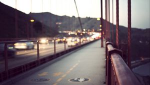 Preview wallpaper city, bridge, rail, fog, blurred, glare, cars, traffic