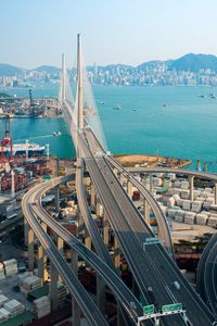 Preview wallpaper city, bridge, road, architecture, ocean, mountains