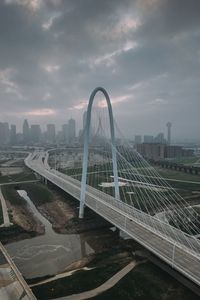 Preview wallpaper city, bridge, road, buildings, aerial view