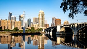 Preview wallpaper city, bridge, skyscrapers, reflection, river, architecture