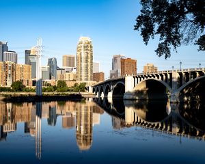 Preview wallpaper city, bridge, skyscrapers, reflection, river, architecture