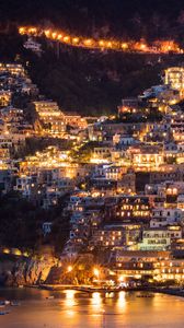 Preview wallpaper city, buildings, aerial view, lights, coast, hilly