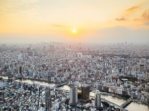 Preview wallpaper city, buildings, aerial view, fog, metropolis, dawn