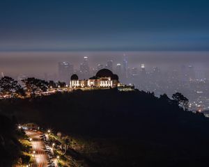 Preview wallpaper city, buildings, aerial view, night, fog