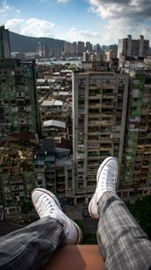 Preview wallpaper city, buildings, aerial view, overview, legs