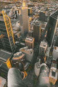 Preview wallpaper city, buildings, aerial view, legs, overview