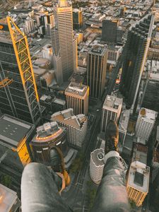 Preview wallpaper city, buildings, aerial view, legs, overview