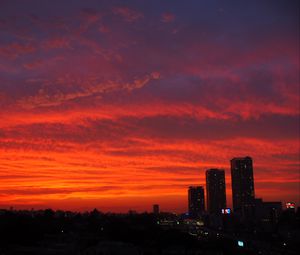 Preview wallpaper city, buildings, aerial view, dusk, sunset