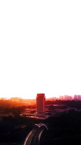 Preview wallpaper city, buildings, aerial view, sunset, light