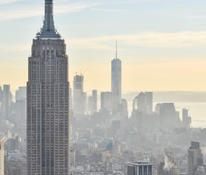 Preview wallpaper city, buildings, aerial view, fog, metropolis