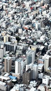 Preview wallpaper city, buildings, aerial view, roofs