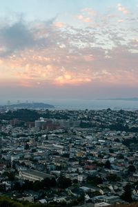 Preview wallpaper city, buildings, aerial view, clouds, fog