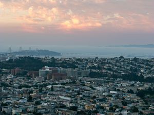 Preview wallpaper city, buildings, aerial view, clouds, fog