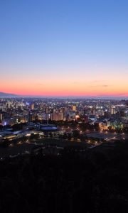 Preview wallpaper city, buildings, aerial view, dusk, cityscape