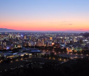 Preview wallpaper city, buildings, aerial view, dusk, cityscape