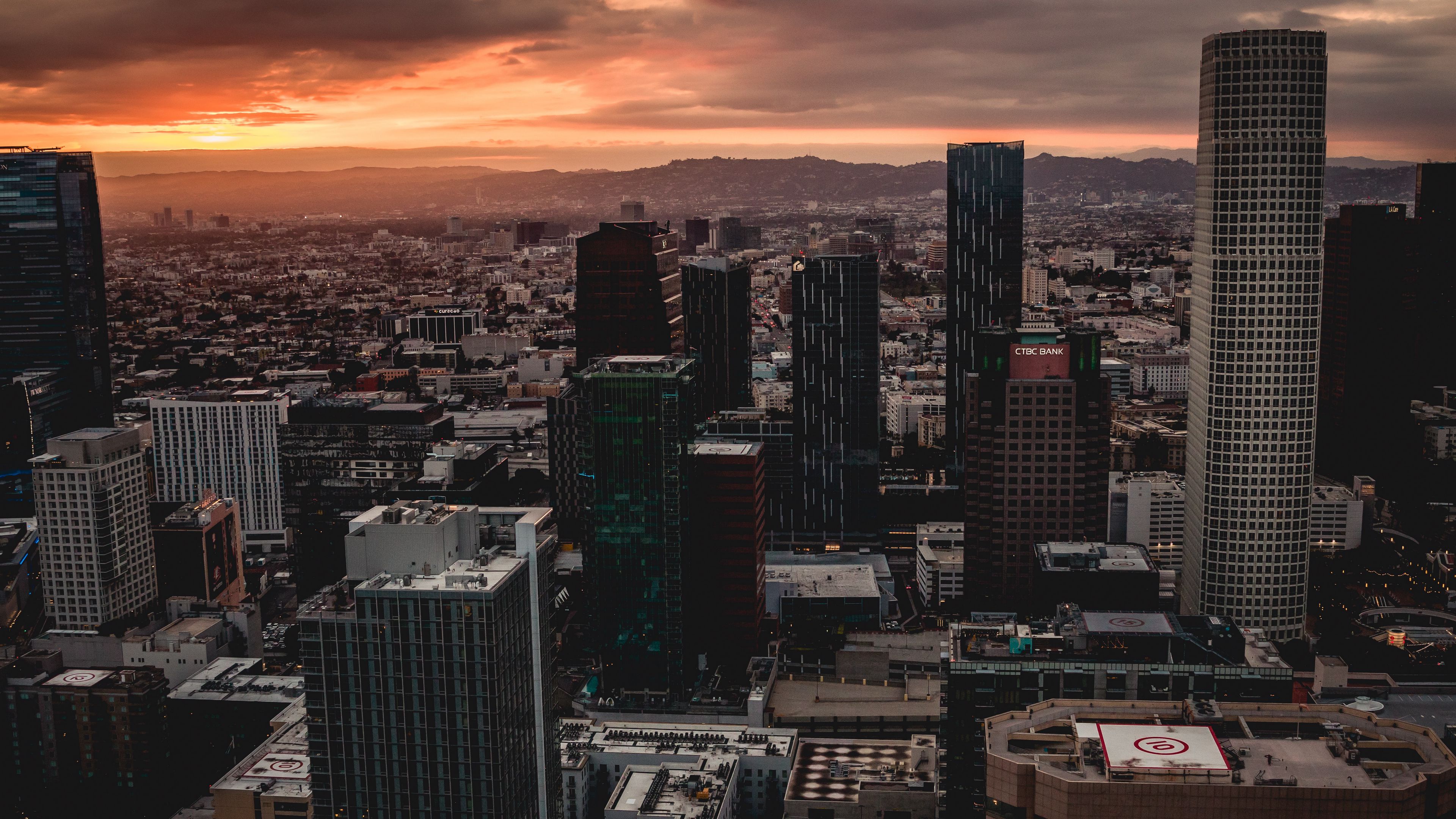 Download wallpaper 3840x2160 city, buildings, aerial view, sunset ...