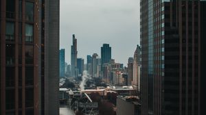 Preview wallpaper city, buildings, aerial view, road