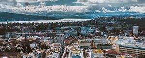 Preview wallpaper city, buildings, aerial view, snow, winter, cityscape