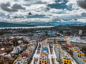 Preview wallpaper city, buildings, aerial view, snow, winter, cityscape