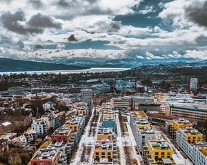 Preview wallpaper city, buildings, aerial view, snow, winter, cityscape