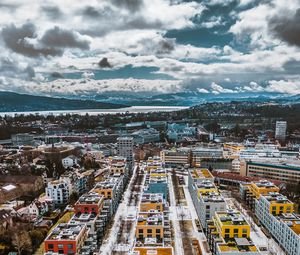 Preview wallpaper city, buildings, aerial view, snow, winter, cityscape