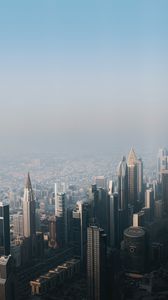 Preview wallpaper city, buildings, aerial view, cityscape, fog