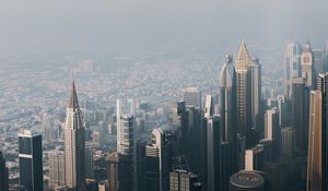 Preview wallpaper city, buildings, aerial view, cityscape, fog