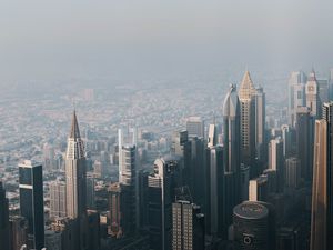 Preview wallpaper city, buildings, aerial view, cityscape, fog