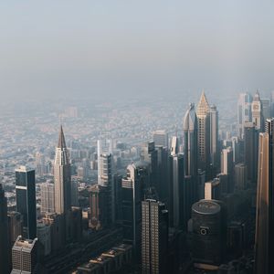 Preview wallpaper city, buildings, aerial view, cityscape, fog