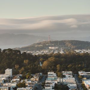 Preview wallpaper city, buildings, aerial view, cityscape, trees