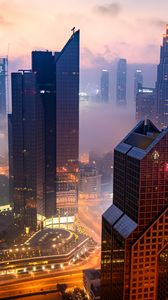 Preview wallpaper city, buildings, aerial view, road, lights, fog