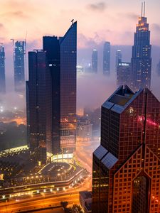 Preview wallpaper city, buildings, aerial view, road, lights, fog