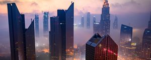 Preview wallpaper city, buildings, aerial view, road, lights, fog