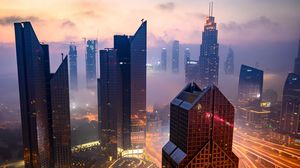 Preview wallpaper city, buildings, aerial view, road, lights, fog