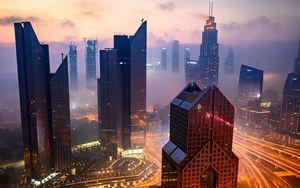 Preview wallpaper city, buildings, aerial view, road, lights, fog