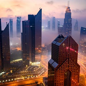 Preview wallpaper city, buildings, aerial view, road, lights, fog