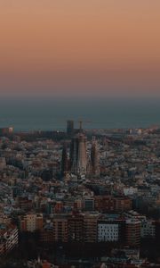 Preview wallpaper city, buildings, aerial view, cityscape, sea, twilight