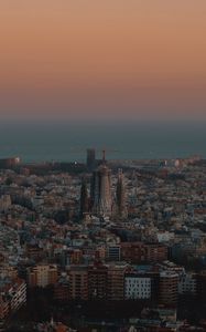 Preview wallpaper city, buildings, aerial view, cityscape, sea, twilight