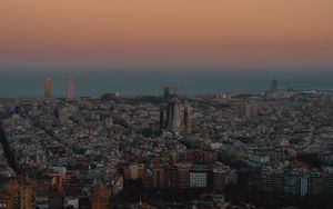 Preview wallpaper city, buildings, aerial view, cityscape, sea, twilight