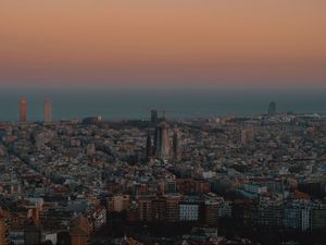 Preview wallpaper city, buildings, aerial view, cityscape, sea, twilight